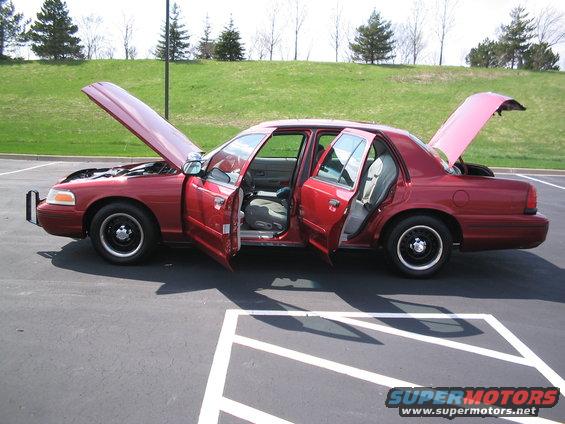 2001 Ford Crown Victoria, side view, all doors open, hood and trunk open
