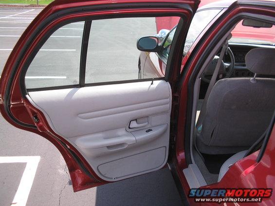 2001 Ford Crown Victoria interior, showing front passenger seat and door panel