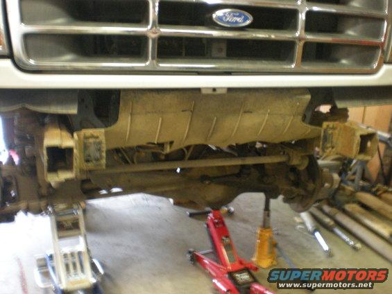 1993 Ford Bronco front grille and suspension lifted on jacks