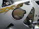 2002 Buell Lightning w/Fairing - A close-up view of a silver motorcycle's fairing displays the 'ZX6R' model designation and a fuel cap.
