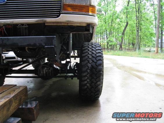 1996 Ford Bronco front axle, suspension, and large off-road tire
