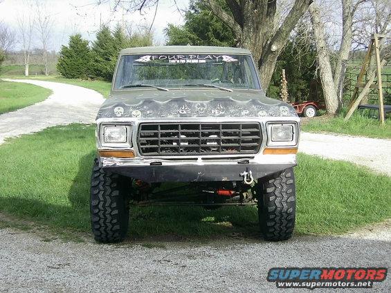 1978 Ford Bronco front view, lifted with large off-road tires and custom bumper
