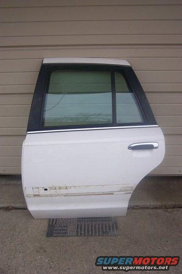 White Ford Crown Victoria rear passenger door, removed from vehicle