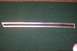 1996 Ford Crown Victoria - A silver and black door trim piece is shown against a dark green background.