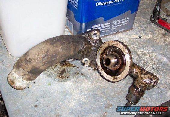 dirty oil cooler adapter with hoses and mounting holes