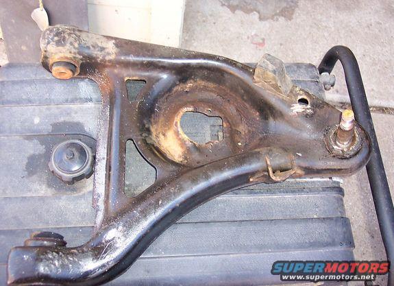 Used suspension control arm with ball joint and bushings