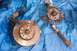 1996 Ford Crown Victoria - Disassembled front suspension components, including a brake rotor and shock absorber, lie on a blue tarp.