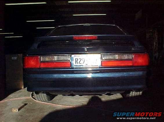 Finished rear with cobra valence 2.5 chrome tips and lx tails w/ gt wing.