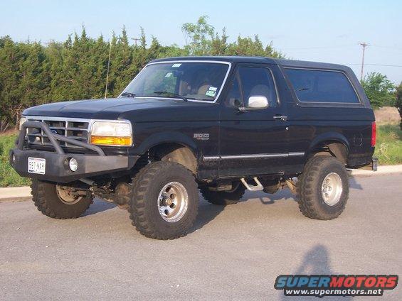 Black 1993 Ford Bronco with aftermarket bumper and lift kit