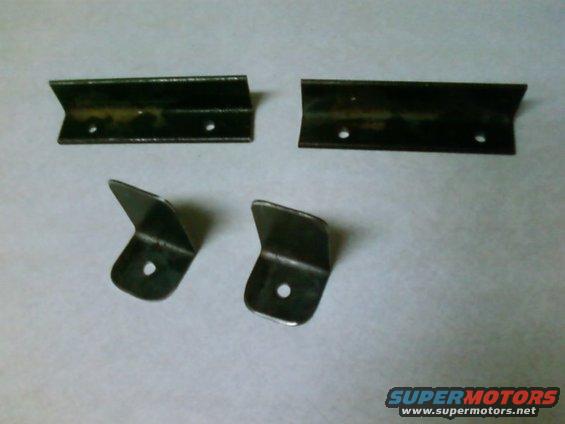 photo0208.jpg Brackets for top and bottom (ones for bottom are on top in pic)
Bottom bracket is 1/8 x 1 steel angle.
Top bracket is 16ga bent to 90.