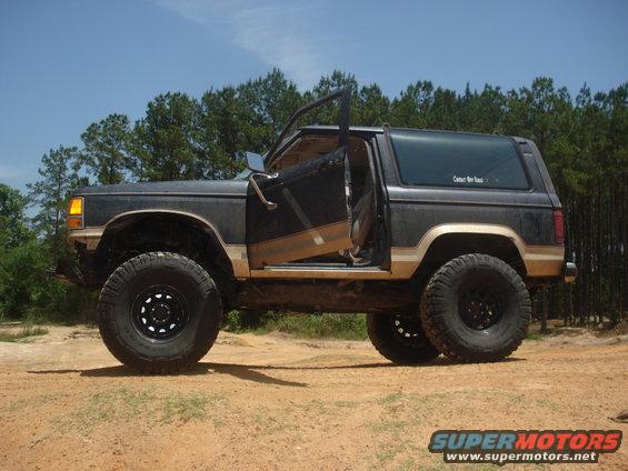 1989 Ford Bronco II with open door and lifted suspension