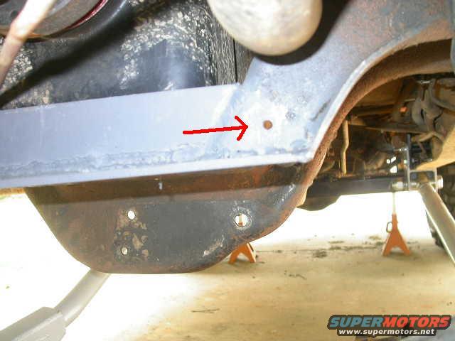 dscn6424.jpg This preexisting hole on the cross member also gets drilled out for mounting the trac bar mount brace.