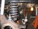 1979 Ford Bronco - Undercarriage view of a vehicle's suspension system, showing modified components and heavy-duty springs.