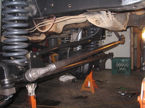 Undercarriage view of a vehicle's suspension and steering linkage