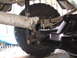 1984 Ford F-150 - Close-up view of the driveshaft and rear axle assembly on a 1984 Ford F-150.