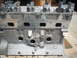1964 Ford 427 - Close-up of an engine block, showing intake ports and a casting number on the side.