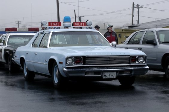 1973 Dodge 1500 police car with light bar and FX-63 license plate