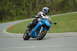 2007 Kawasaki Ninja R - A rider navigates a curve on a blue sportbike, with a number '771' visible on the fairing.