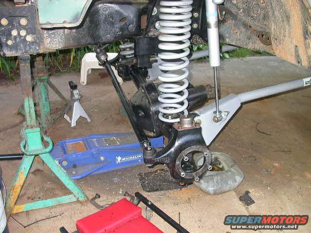 dscn6457.jpg Coils and shocks mounted, I used Bilstein 5150's, mounted for 5" up travel and 9" down.