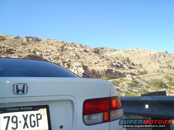 White Honda sedan rear with Tucson, Arizona license plate 79-XGP
