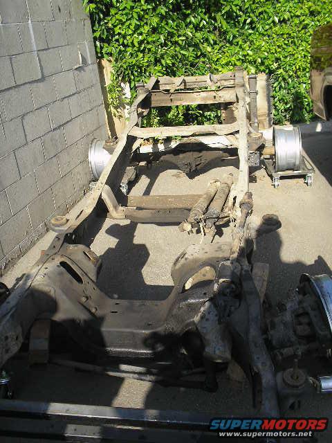 Vehicle frame and suspension components, including axles and wheels, outdoors