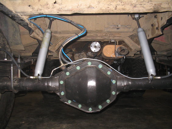 Rear axle and suspension with dual shocks and air lines
