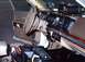 1991 Ford Crown Victoria - The interior of a 1991 Ford Crown Victoria police car, equipped with various radio communication devices and a light bar on the dashboard.