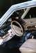 1991 Ford Crown Victoria - Interior view of a 1991 Ford Crown Victoria, equipped with police radio and other gear.