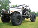 1992 Ford Mustang - This heavily modified 1974 Ford Bronco features a custom roll cage, oversized off-road tires, and a winch on the front bumper.
