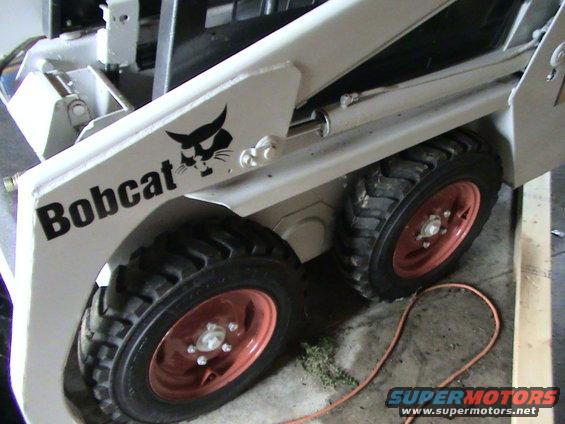 Bobcat skid steer loader with its logo visible on the side