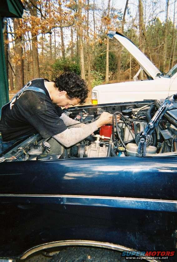 engine2_8.jpg That's Shane priming the oil pump.