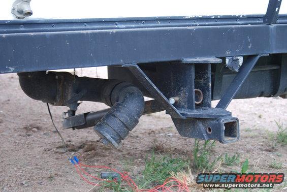 Trailer hitch and drawbar. Drawbar is not very strong and may be only to keep camper in bed of truck.
