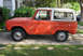 1977 Ford Bronco - Side view of a 1977 Ford Bronco, showing its classic body style and two-tone paint.