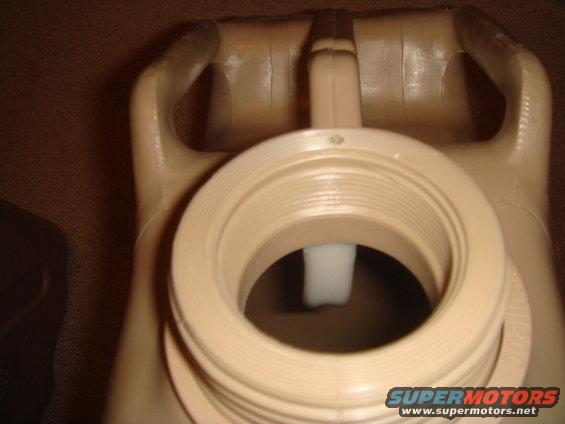 Close-up of the opening of a tan jerry can