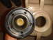 1992 Ford Bronco - A person holds a fuel cap next to an open jerry can, revealing a mesh filter inside the cap.
