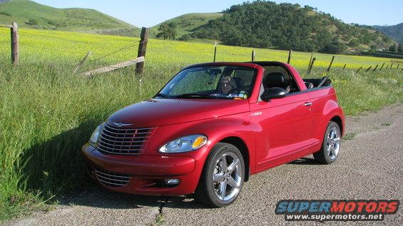 Red 2005 Chrysler PT Cruiser convertible parked roadside