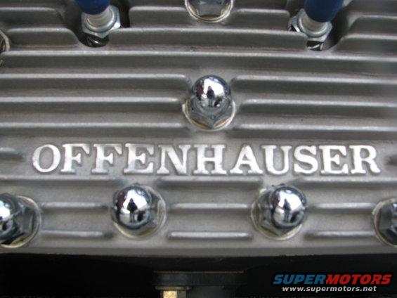 Aluminum engine component with 'OFFENHAUSER' text and chrome bolt heads