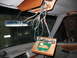 1995 Ford C-350 (Centurion Conversions) - Wiring and circuit board assembly hanging from the overhead console of a vehicle.