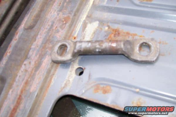 100_2123.jpg Rear seat holddown bracket.