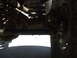 1978 Jeep Cherokee - This photo shows the undercarriage of a vehicle, focusing on the axle and suspension components.