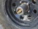 1978 Jeep Cherokee - Warn locking hub on a wheel, showing 'LOCK' and 'FREE' settings.