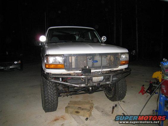 1996 Ford Bronco front view with custom metal bumper and winch