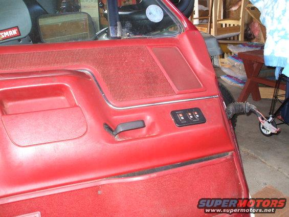 red-interior-door-shot.jpg Full power...intact.  Red interior will go bye bye...replaced by my blue.  