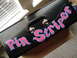 1979 Chevrolet C/K Pickup - A black toolbox with "Pin Striper" written in pink and blue lettering is shown.