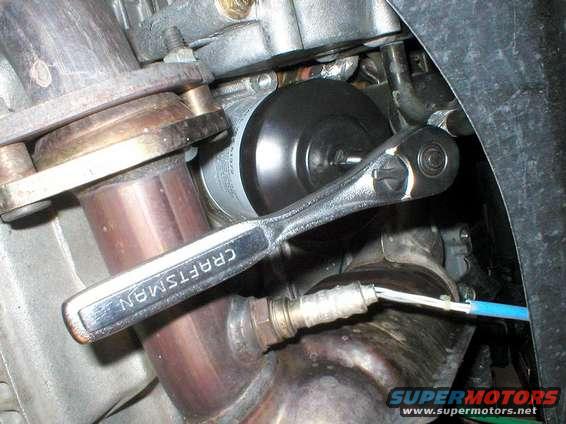 Epilogue:
Just did the 2nd oil change at ~9,000 miles.
Picked up a new filter wrench.
You can see it takes a 3/8" drive ratchet and a short 2" extension.
Plenty of room now to turn the filter off.
I got a "Rite Fit" part no. A252 from a local auto parts store.
Any size "C" cap wrench should work.
Dimensions are 93mm X 15 flute.