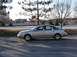 1999 Audi A6 - Side view of a silver 1999 Audi A6 sedan parked outdoors on a sunny day.