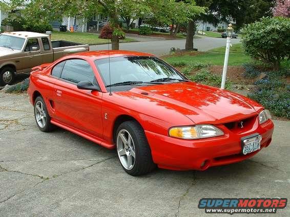 front_right_03_wheels.jpg Front right pic with 2003 AFS Cobra wheels.  17" x 9"