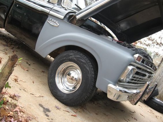 1966 Ford F-100 front fender and chrome wheel with hood open