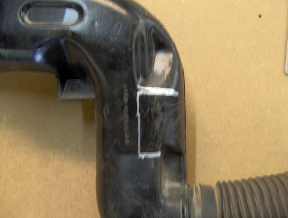 132.jpg I need to heat up the factory duct work to allow my radio to go into the dash deep enough.