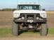 1978 Ford F-150 - This 1978 Ford F-150 pickup truck is shown from the front, equipped with a winch and brush guard.
